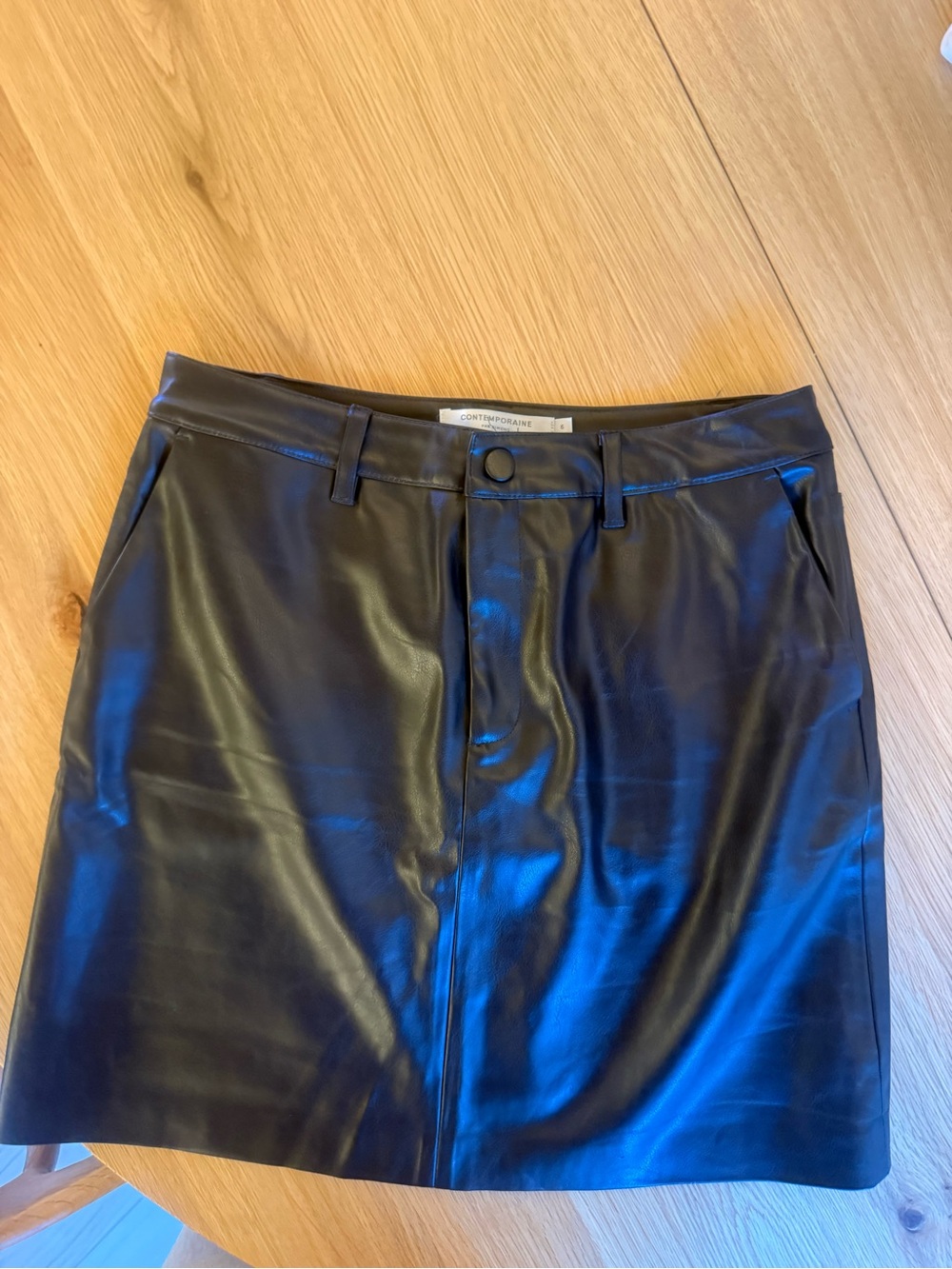Men's black faux leather pants - likely Dress or Chinos
